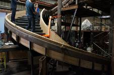 The steel will be sandwiched between the hull and the skirts (shown here)