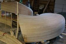 The two hull parts shown in this image make up the first 8 foot rise of the stairway and the upper piece is scribed to fit flat to the floor - these are upside down. The highest point will be the floor level