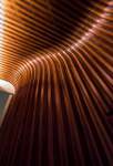 The curves at the top of the wall was where Pure Timber could really show what can be bent in solid bent walnut